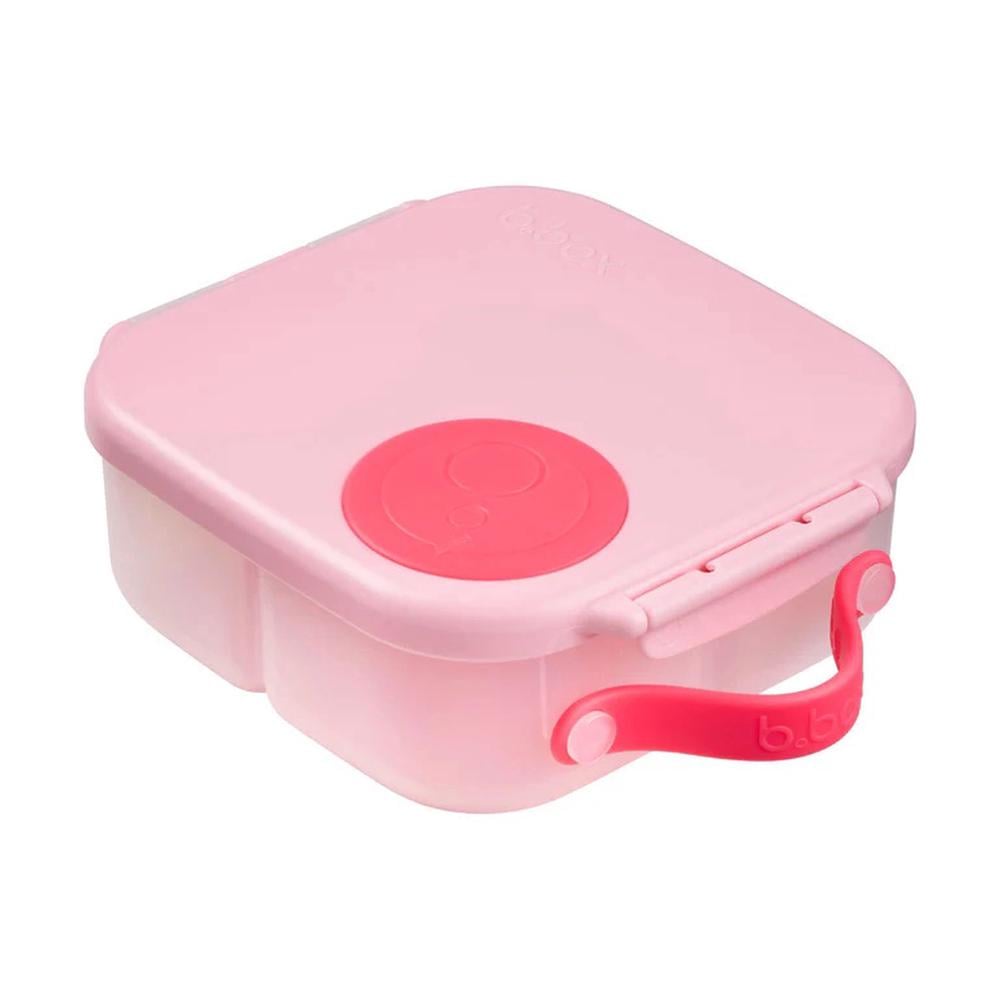 Recipiente de almoço b.box mini rosa, fechado, com fecho vermelho e pega lateral.