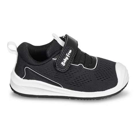 Sapatilha BabyFree Barefoot para criança, cor negro, com sola branca, fecho de velcro e elásticos. Vista lateral.