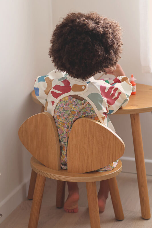 Beaba Babete com mangas evolutivo 2 em 1 Playful em utilização