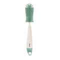 Escova de silicone 2 em 1 Béaba em verde sálvia para limpar biberões e tetinas