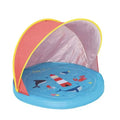 Tenda Olmitos Praia e Jardim Deep Blue aberta, com piscina azul e capota vermelha, fundo branco.
