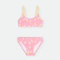 Biquíni de praia para menina da marca Waterlemon com estampado de palmeiras em fundo rosa.