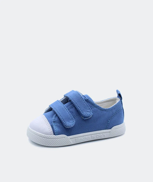 Blanditos by Crio's em azul médio com fecho de velcro e biqueira em borracha branca.