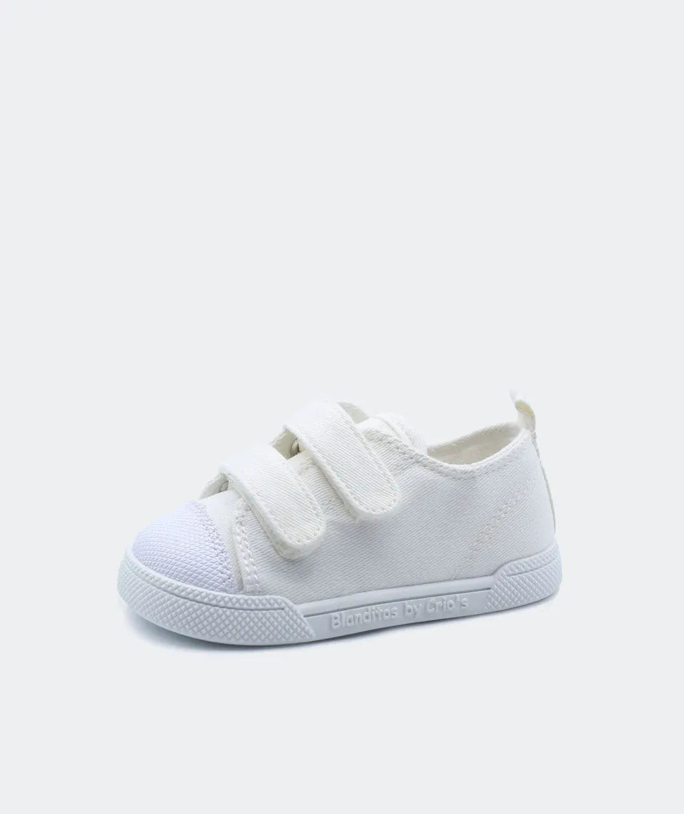 Blanditos by Crio's em branco com fecho de velcro e biqueira em borracha branca.