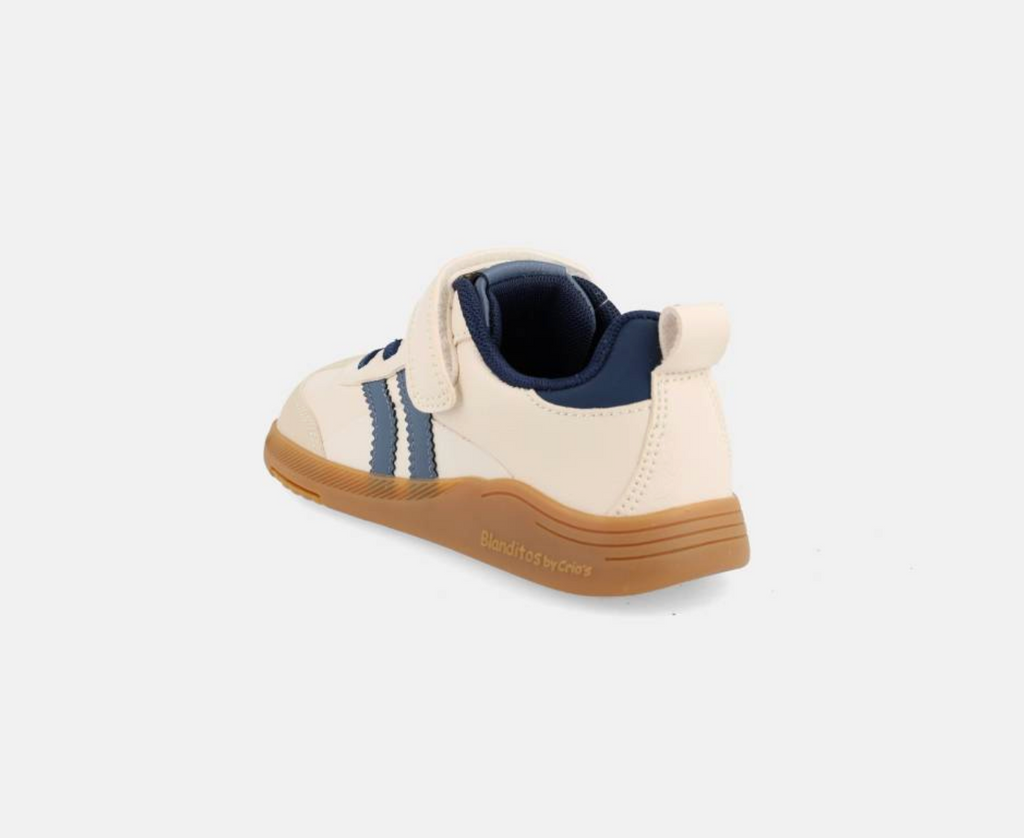 Vista traseira superior do desportivo barefoot Ares Beige, destacando o reforço do calcanhar azul-escuro e a sola de borracha.