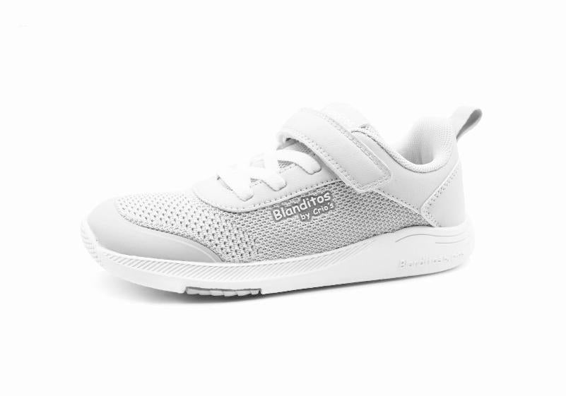 Desportivo infantil Barefoot Blanditos Venus 3 branco, vegano, com malha respirável e fecho de velcro, visto de perfil.