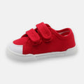Sapatilha barefoot infantil Blanditos by Crio's, modelo Coco, em lona vermelha com fecho de duplo velcro e sola branca.