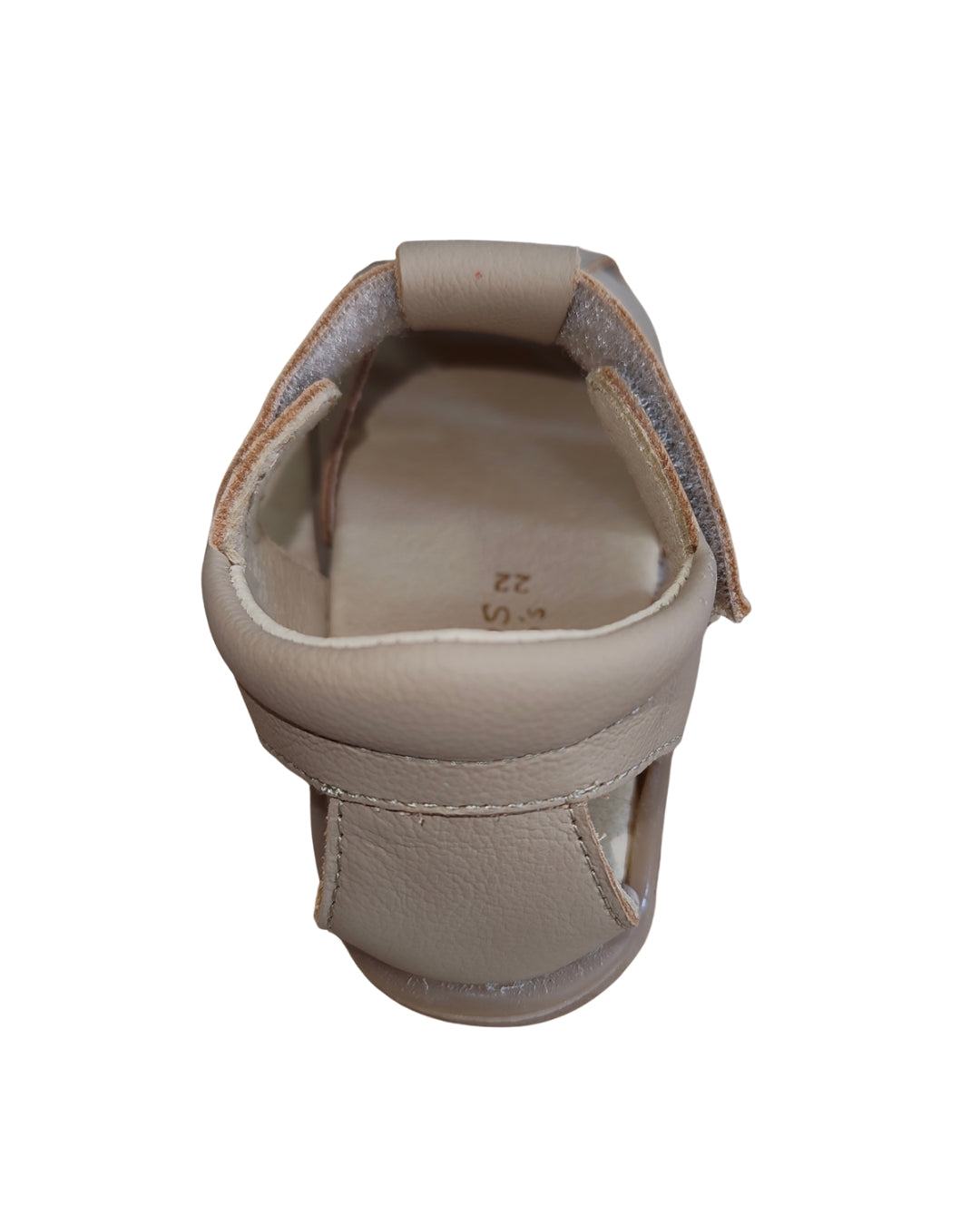 Vista superior da sandália infantil Blanditos costa arena, mostrando o interior em pele e o fecho de velcro ajustável no calcanhar.