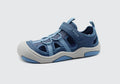 Sandália desportiva barefoot para criança Blanditos by Crio's, modelo Olimpo em azul, com fecho de velcro e biqueira reforçada.