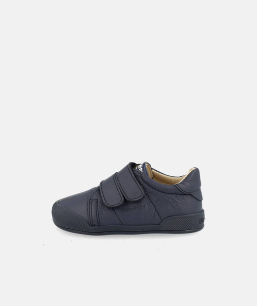 Sapatilha barefoot Blanditos Londres Navy, vista lateral completa, mostrando a sola fina, plana (zero drop) e o material em pele suave.