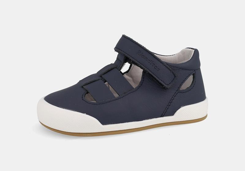 Sandália infantil barefoot azul-marinho da Blanditos by Crio's, com fecho de velcro e sola branca e castanha clara.