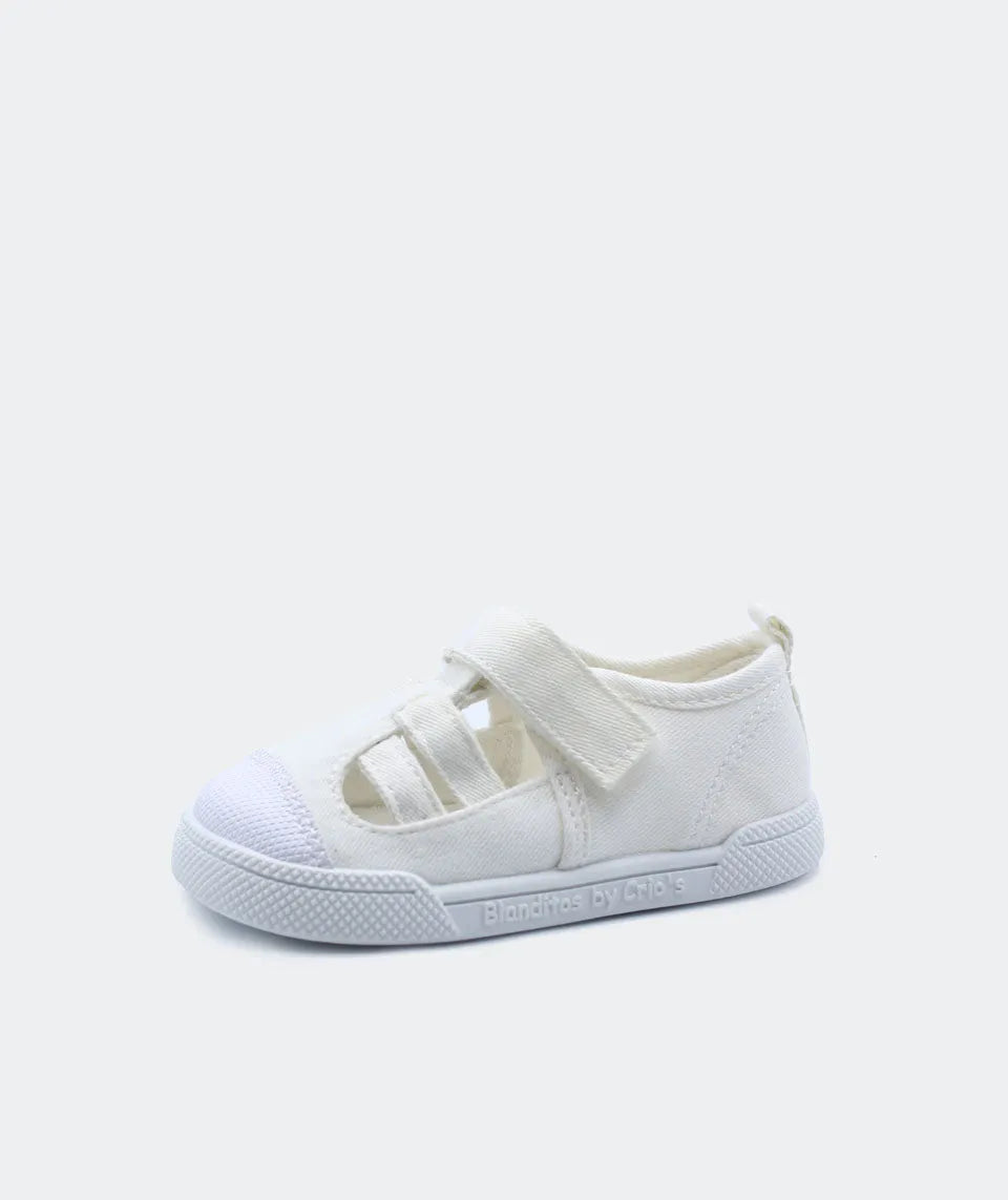 Calçado barefoot Blanditos by Crio's em branco, com fecho em velcro, sola flexível e design respeitador para liberdade de movimentos.