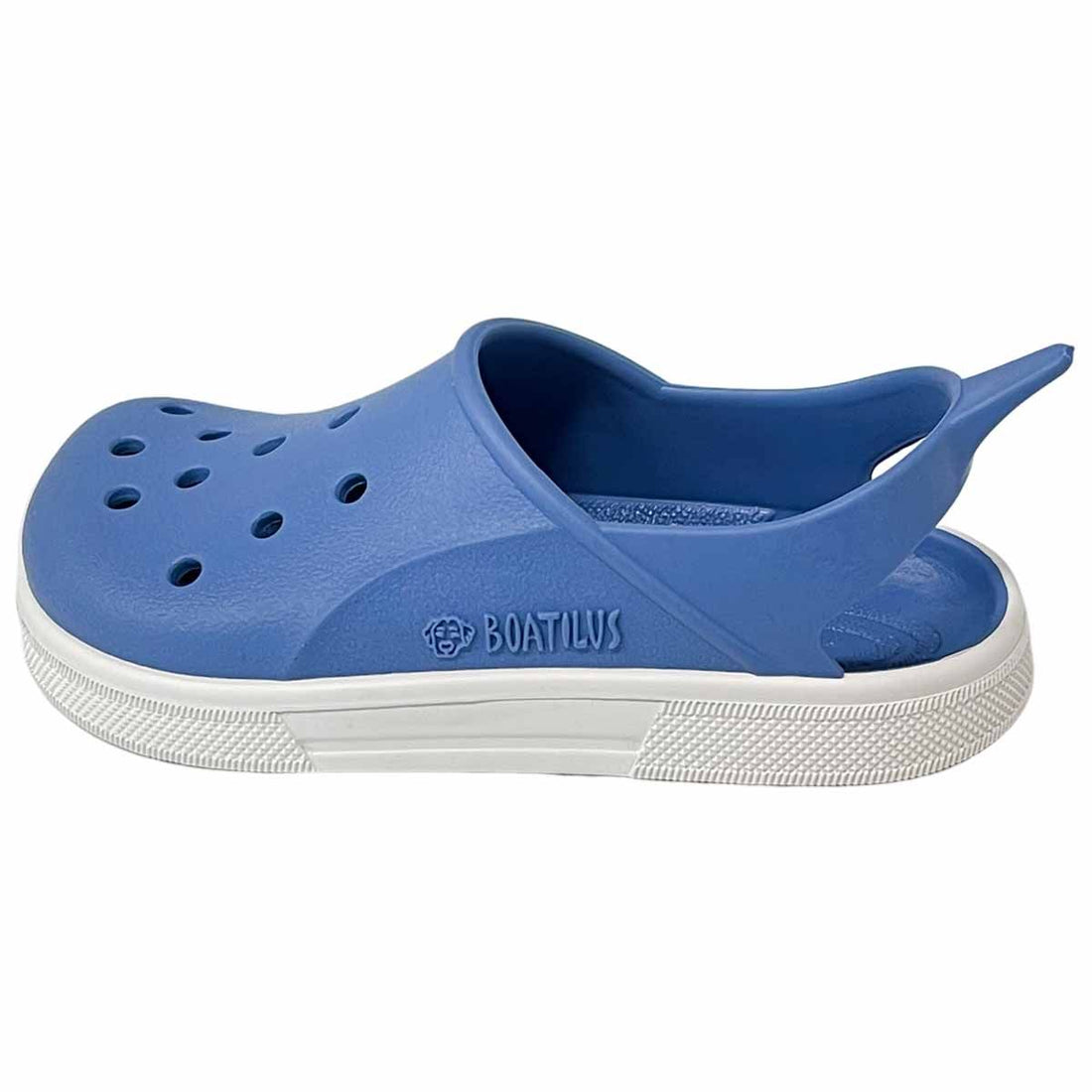 Sandália minimalista Boatilus Cloggy Jeans e Branco, vista lateral mostrando a sola branca e o topo azul com furos.