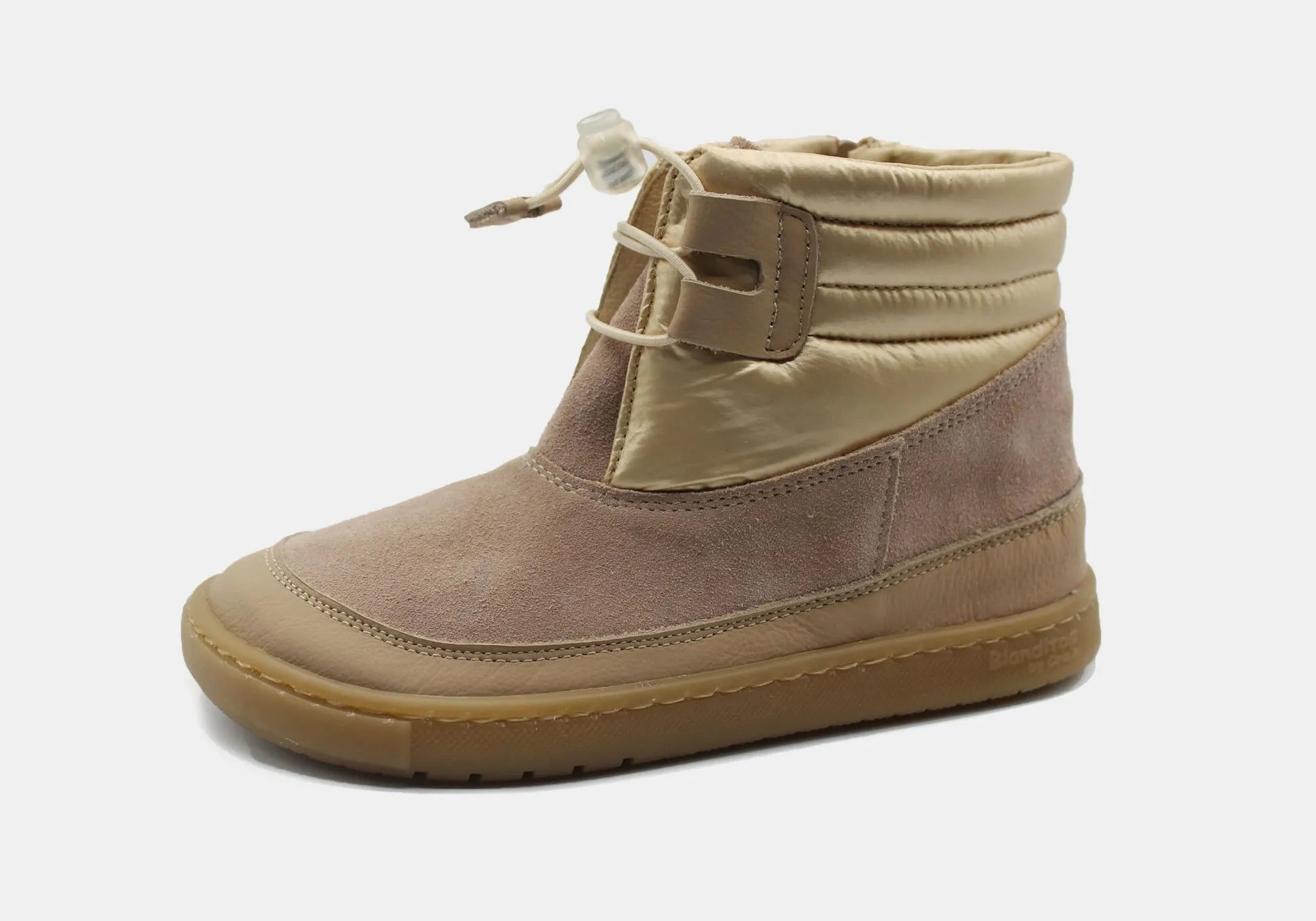 Bota Barefoot Lion da Blanditos by Crio's para criança, calçado respeitador em couro na cor Arena (bege). Vista lateral mostrando a sola castanha fina e flexível. Calçado Barefoot com atacador elástico.