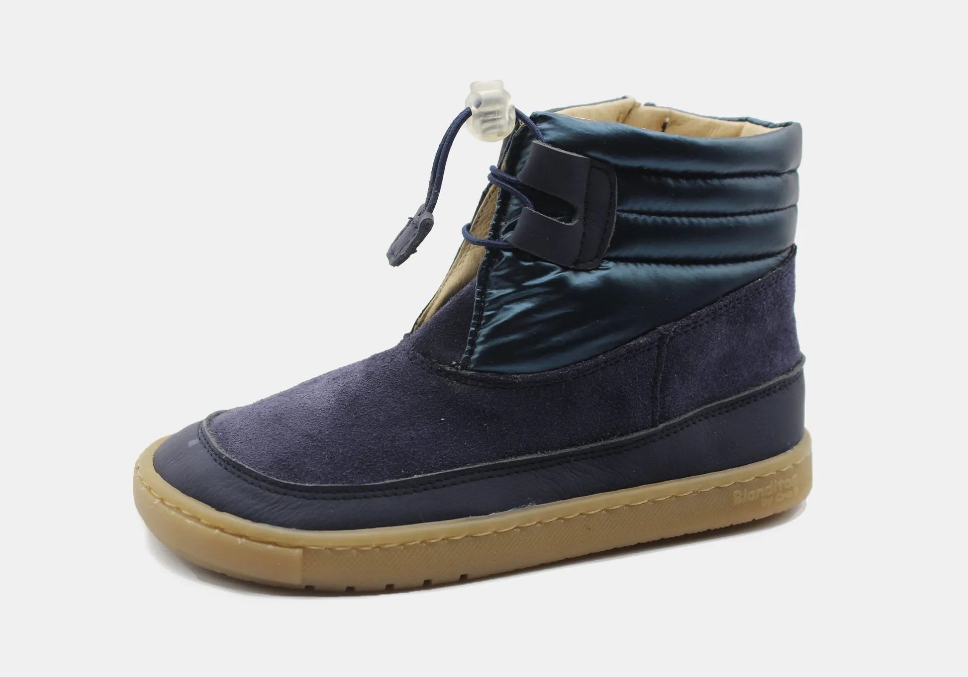 Bota Barefoot Lion da Blanditos by Crio's para criança, calçado respeitador em couro azul escuro (cor Navy). Vista lateral, calçado Barefoot com sola castanha flexível e fecho de correr visível.