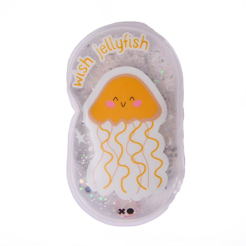 Close-up do brinquedo Jellywish, uma alforreca amarela sorridente dentro de um invólucro transparente cheio de purpurinas e estrelas.