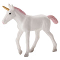 Figura de um unicórnio branco em miniatura, com chifre dourado e crina/cauda rosa brilhante, em pose de caminhada contra fundo branco.