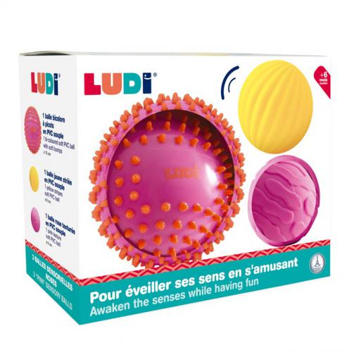 Embalagem de brinquedos de atividade para o bebé com 3 bolas sensoriais da marca Ludi em tons de rosa e roxo.