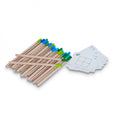 Conjunto de 24 fósforos de madeira com pontas coloridas (azul e verde) e um maço de cartas de desafio para o jogo de lógica BS Puzzle.