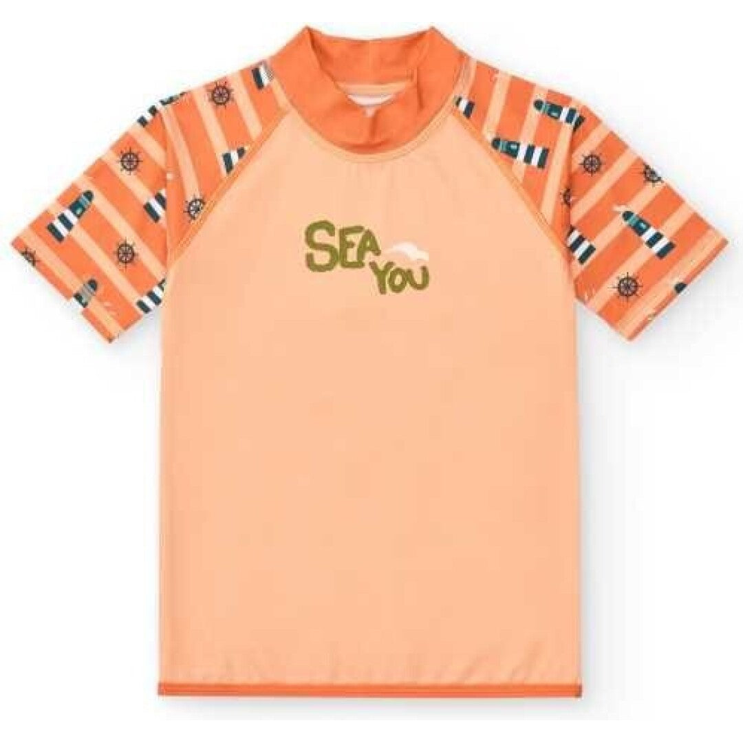 Camisola de verão infantil BtBox cor pêssego com mangas curtas estampadas a riscas, faróis e lemes, e texto "Sea You".