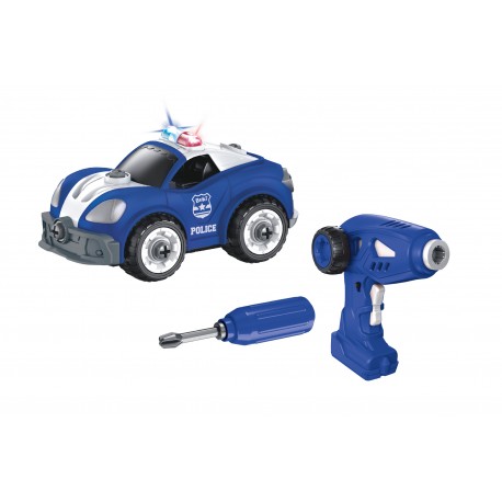 Componentes do brinquedo Buki: carro de polícia azul montado, chave de fendas e comando de rádio elétrico azul, dispostos sobre fundo branco.