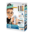Caixa do kit "Buki Constrói Pulseiras da Amizade" com ilustração de um rapaz a usar óculos a criar uma pulseira com a roda de espuma. Indica 10 pulseiras e idade 8+.