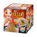 Caixa do kit científico Buki Mini Vulcão, mostrando uma criança a adicionar reagentes para simular uma erupção vulcânica vermelha. Idade 8+.