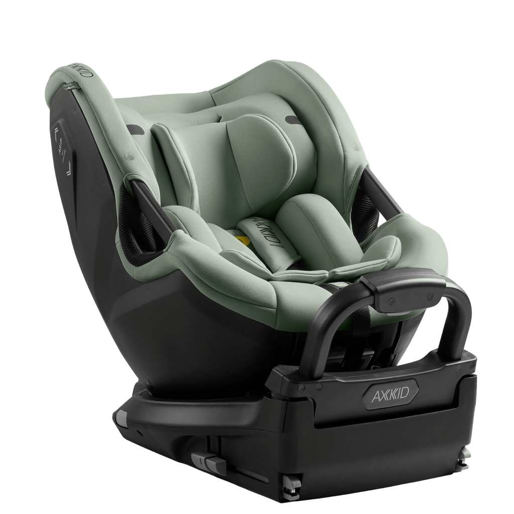 Cadeira auto Axkid Spinkid 2 na cor verde-água, vista de lado, com base Isofix e barra de apoio frontal.