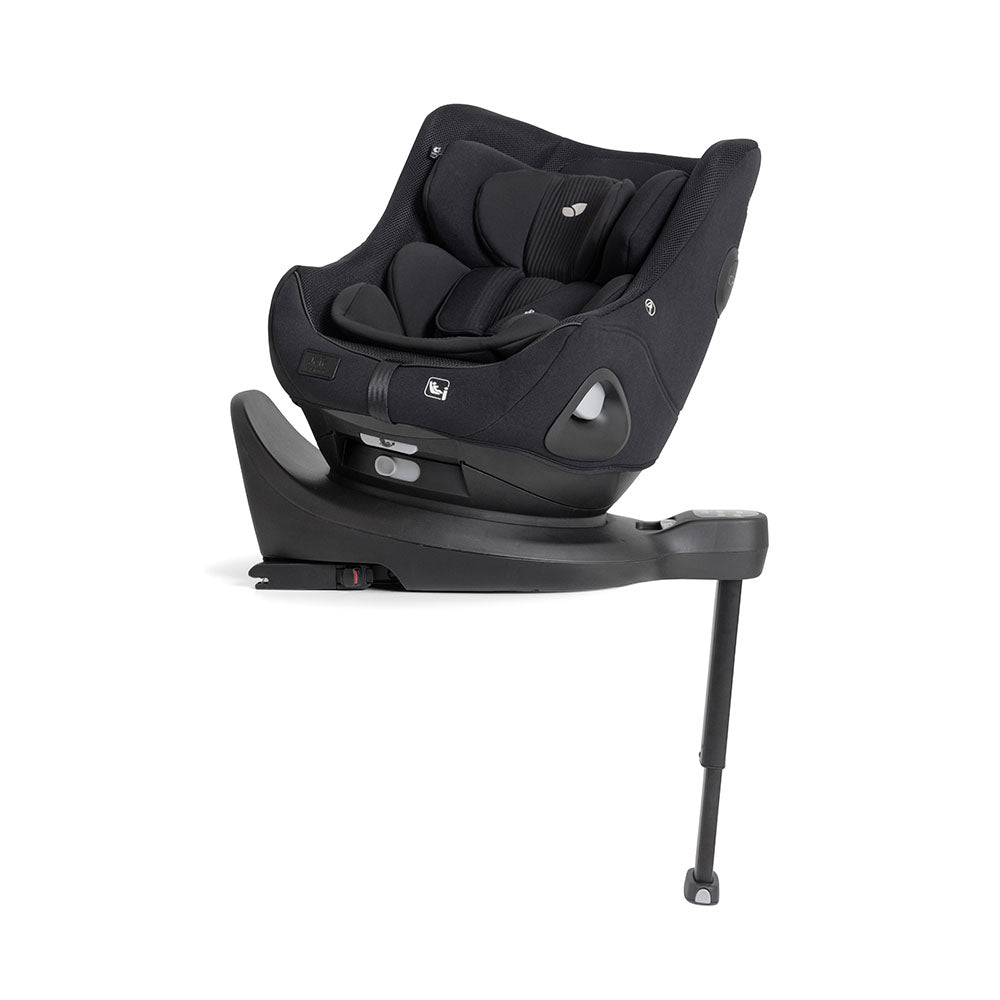 Cadeira auto Joie I-Harbour PRO da gama Signature em tom verde tropa, instalada na base rotativa com perna de apoio.