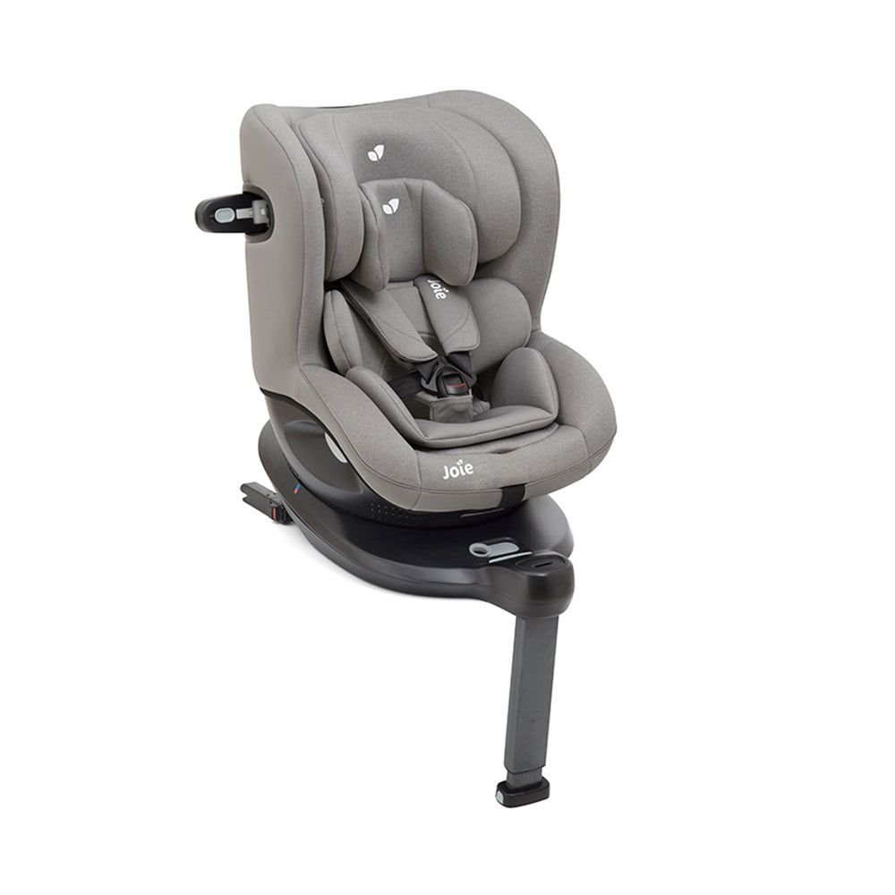 Cadeira auto Joie i-Spin 360 em cor escura, instalada no veículo em posição contra-marcha (rear-facing), mostrando o sistema ISOFIX e a perna de apoio.