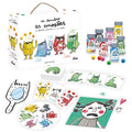 Vista geral da caixa "Eu Descubro as Emoções: Monstro das Cores" com todos os componentes, incluindo potes coloridos, cartas e um espelho.