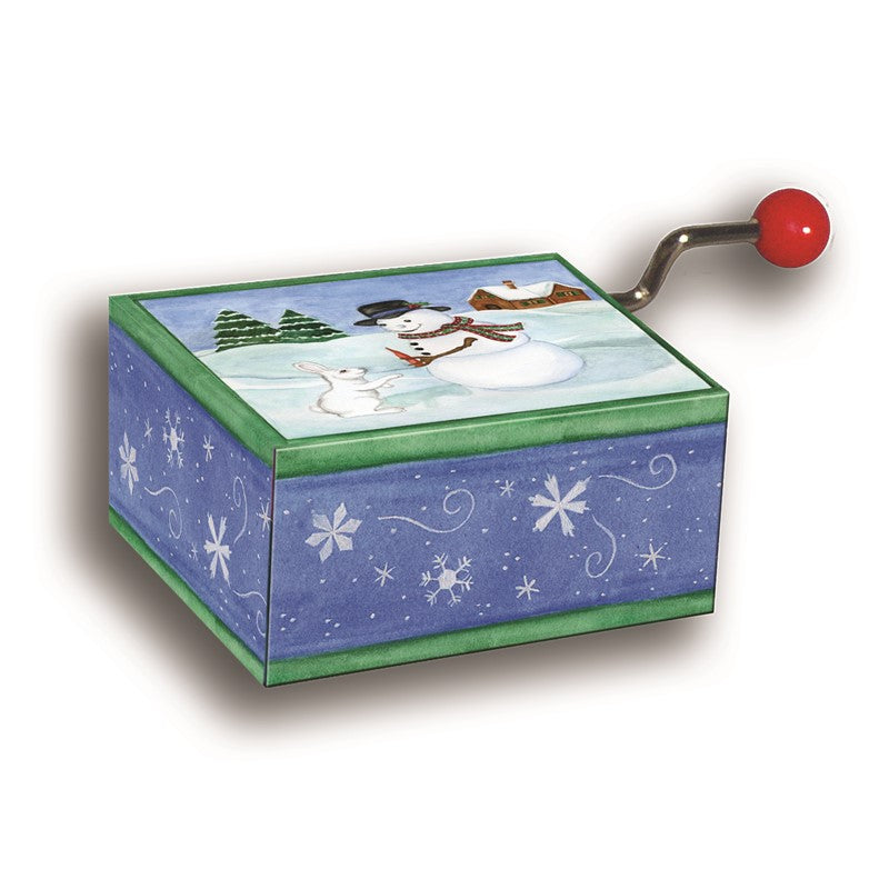 Caixinha de música de Natal com ilustração de um boneco de neve e um coelho num cenário invernal, com manivela para tocar a melodia.