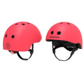 Capacete infantil Yvolution em cor vermelho vibrante com sistema de ajuste visível.