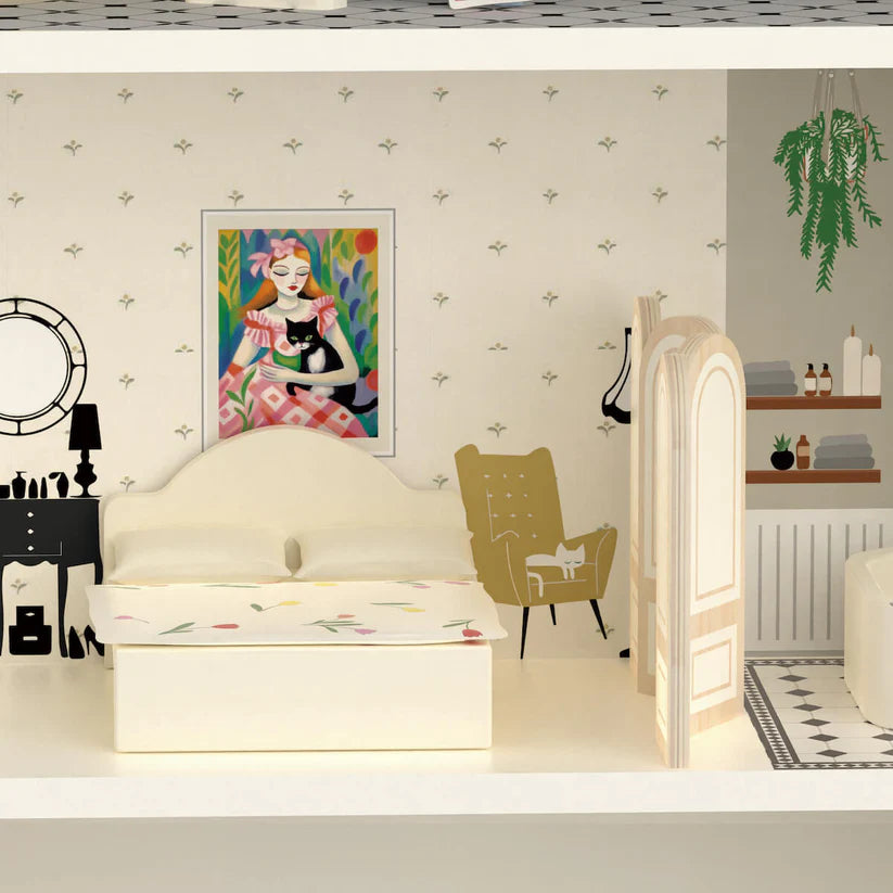 Pormenor do quarto e casa de banho da casa de bonecas Classic World, com cama, poltrona e banheira.