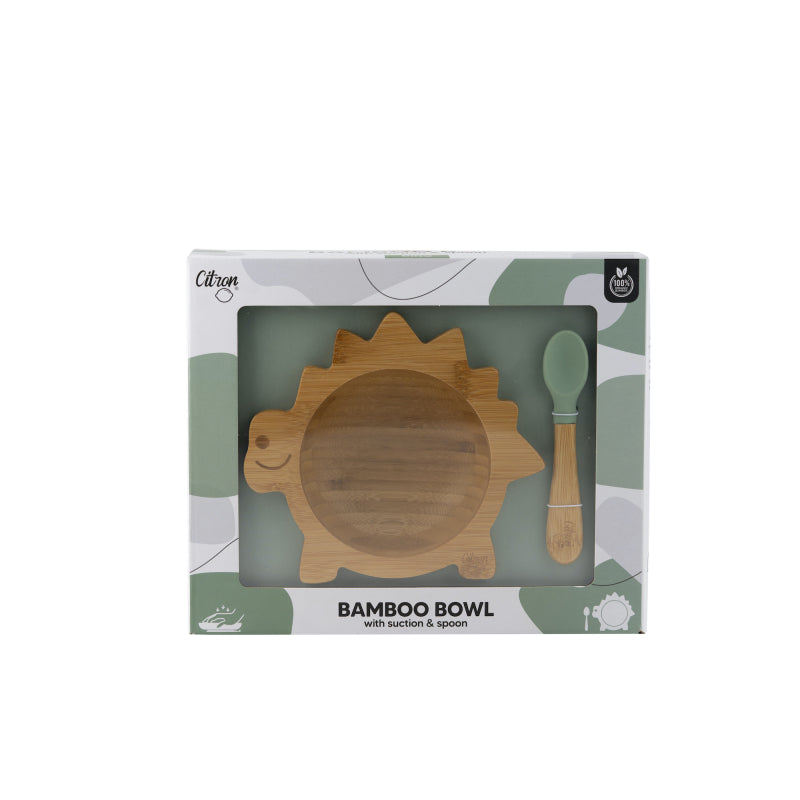 Conjunto de alimentação Citron (Tigela dinossauro e colher) na embalagem de cartão com janela transparente.