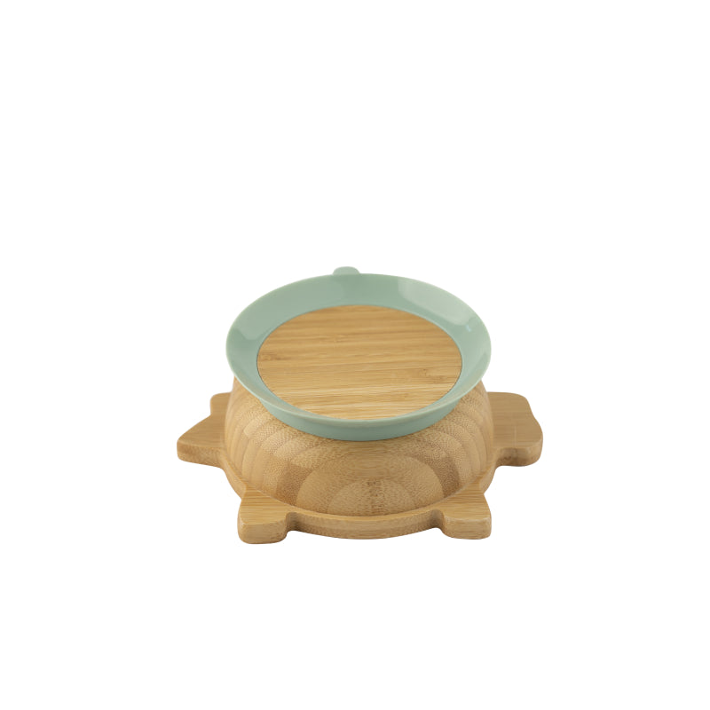 Tigela de bambu Citron vista de baixo, mostrando a base de ventosa de silicone verde-água destacável.