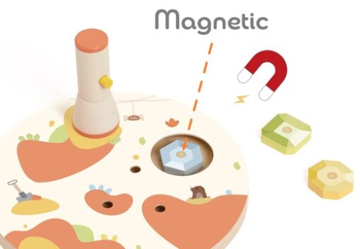 Detalhe da lanterna magnética a levantar uma pedra preciosa, mostrando a mecânica de jogo.