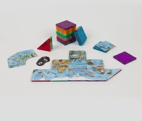 Componentes do jogo IMANIX Brainbox dispostos sobre uma superfície branca, incluindo o mapa-mundo montado, peças magnéticas coloridas e cartas de desafio.