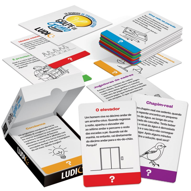 Componentes do jogo "Golpe de Génio" espalhados: caixa aberta, cartas de enigma (O elevador, Chapim-real) e cartas de solução, ilustrando o desafio de pensamento lateral.