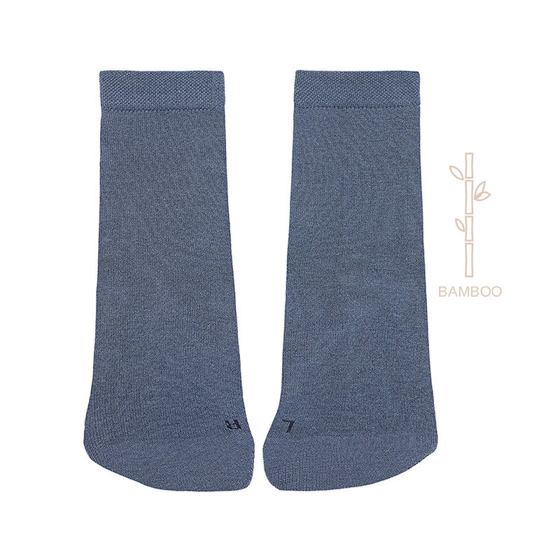 Par de meias Condor Bamboo Oxford cor azul-acinzentada, mostrando a parte superior e o tecido liso, com o ícone de bambu.