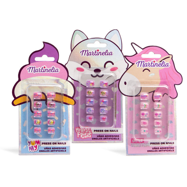 Três embalagens de unhas postiças infantis Martinelia: Little Unicorn (unicórnio), Yummy (comida/doce) e My Best Friend's (cão/gato), lado a lado.