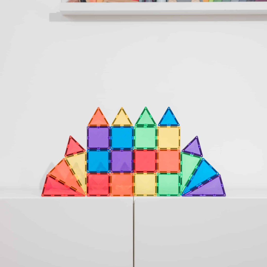 Connetix Jogo blocos Magnético Rainbow Mini 24 pc caixa do produto, mostrando o conteúdo de 24 peças e recursos.