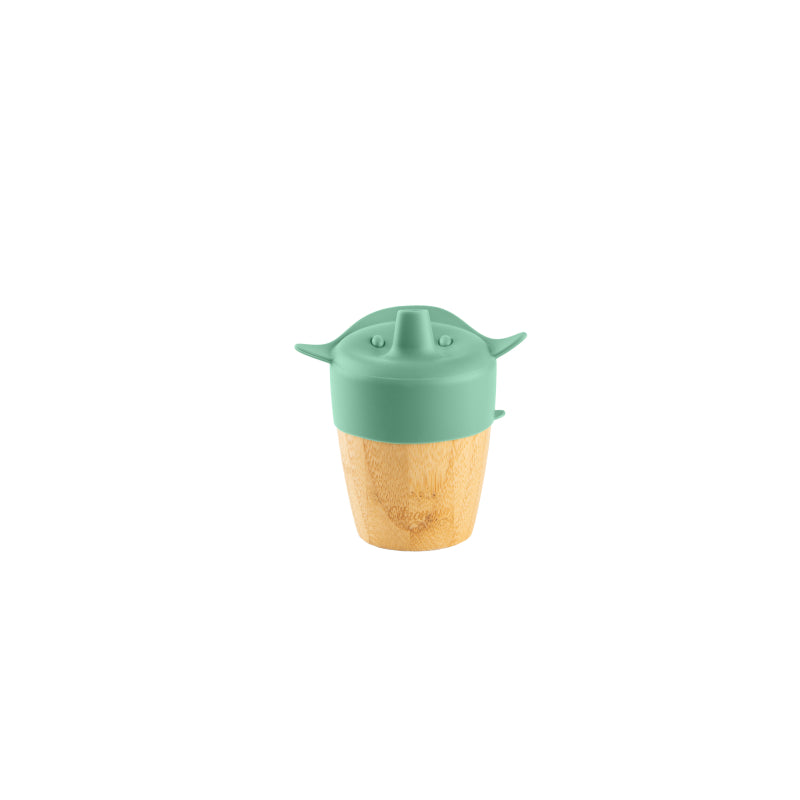 Copo de bambu Citron com tampa de silicone verde em forma de urso, visto de frente, isolado em fundo branco.