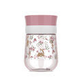 Imagem de estúdio do copo de treino 360º Little Dutch Mepal com padrão de veados e flores em tons de rosa e verde.