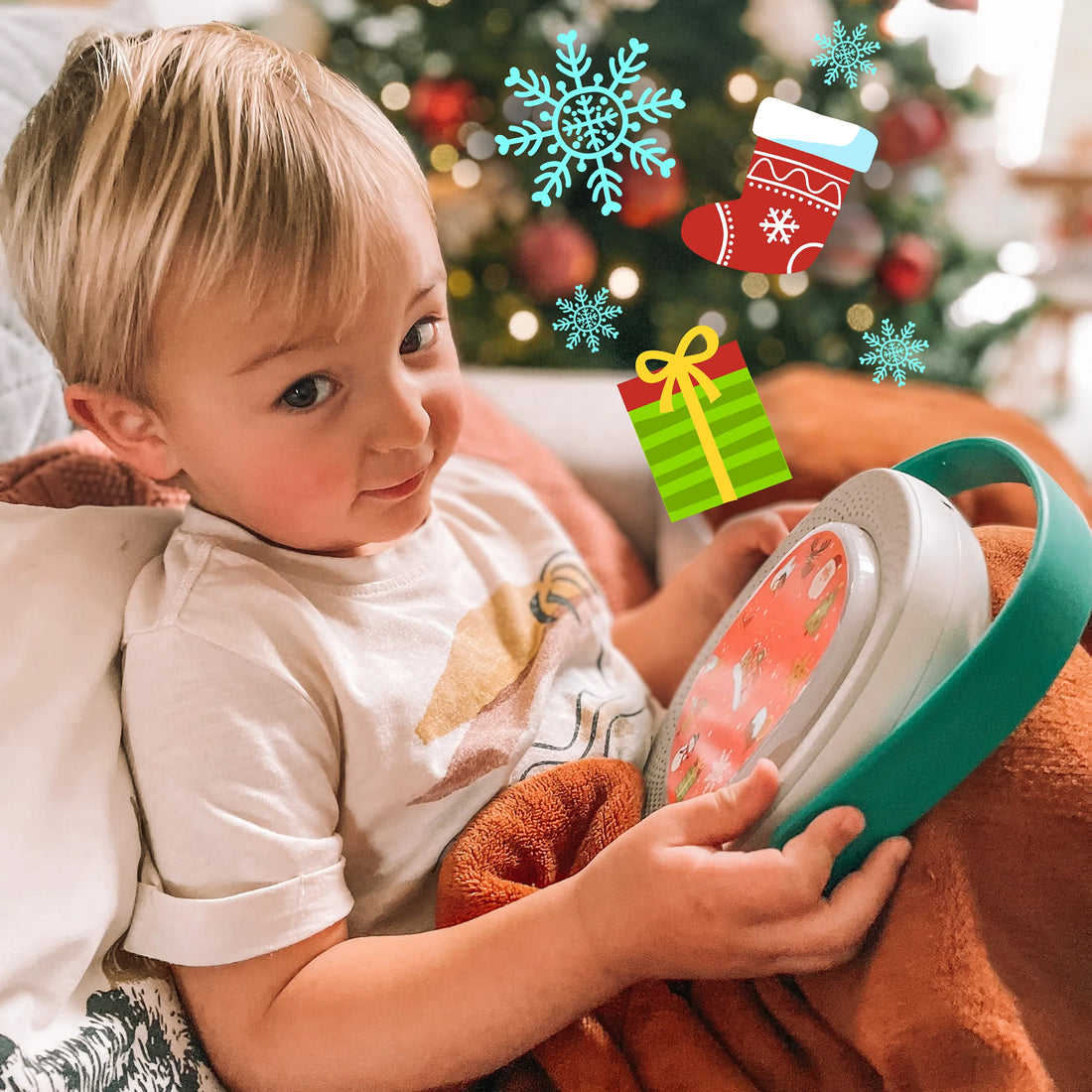 Conjunto Timio de 96 canções de Natal de todo o mundo, apresentado numa caixa festiva com ilustrações natalícias.