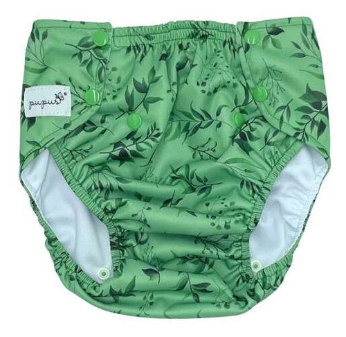 Detalhe frontal da fralda pull-up Pupus Feel Green mostrando o sistema de molas laterais e elásticos suaves.
