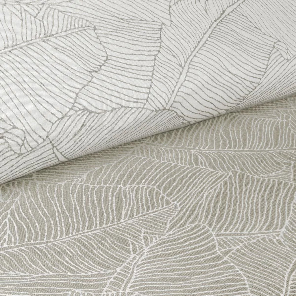 Detalhe do padrão jacquard de folhas no tecido de linho e algodão do sling Hoppediz Grenada.