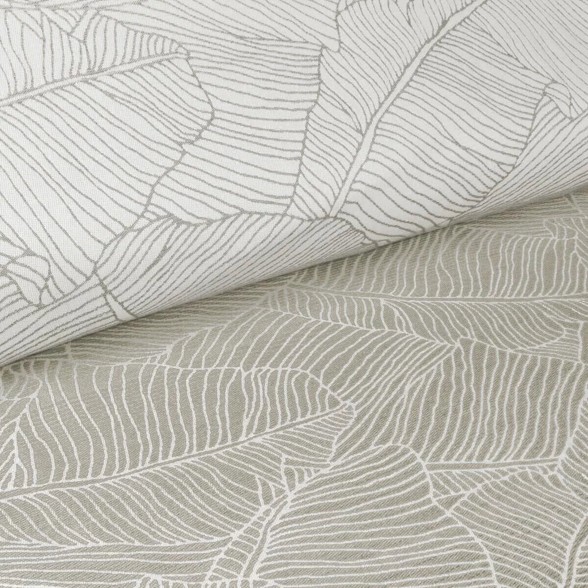 Detalhe do padrão jacquard de folhas no tecido de linho e algodão do sling Hoppediz Grenada.
