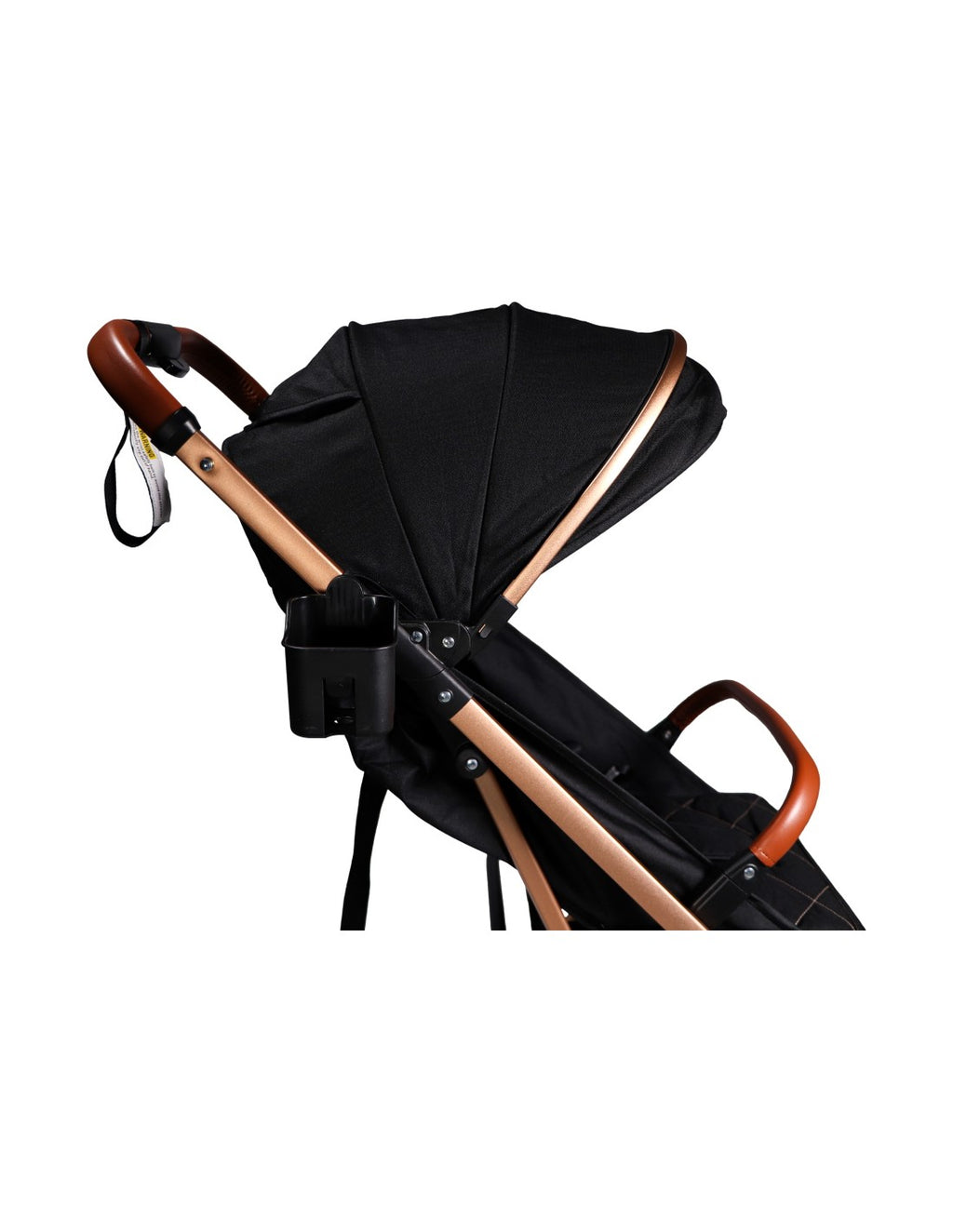 Detalhe do topo do carrinho Ding Vivo, mostrando o punho em imitação de pele castanha, capota preta e suporte para copos acoplado.