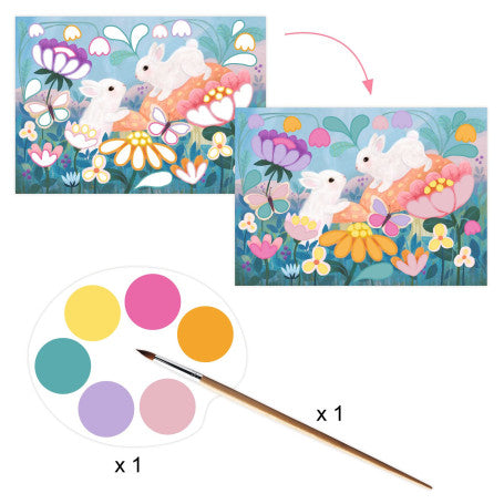 Componentes da Djeco Fluffy Box para atividades de raspadinha e modelagem, incluindo folhas coloridas brilhantes e um cartão com um cisne para raspar.
